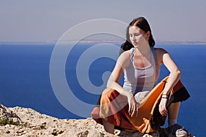 Woman breathing by the sea