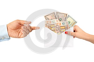 Woman bribing a man with an envelope full of money