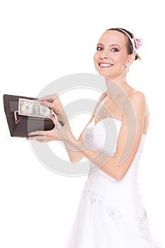 Woman bride with one dollar. Wedding expenses.