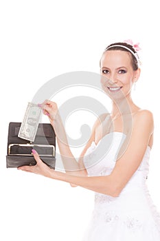 Woman bride with one dollar. Wedding expenses.