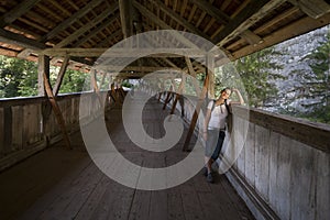 A woman on a bridge