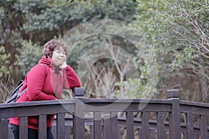 Woman on bridge jiuxianshan mountain, adobe rgb