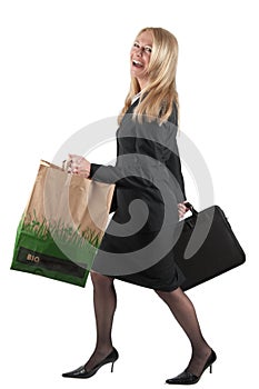 Woman with briefcase and carrier bag