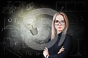 Woman and bright bulb over icons background.