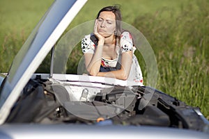 Woman and broken car