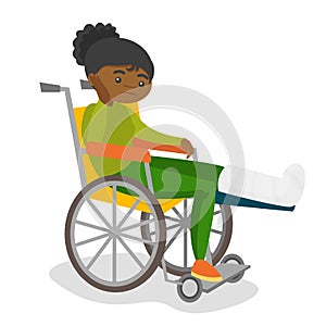 Woman with broken leg sitting in a wheelchair.