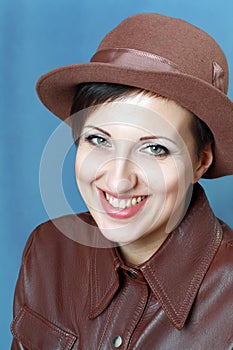 Woman in brown leather jacket