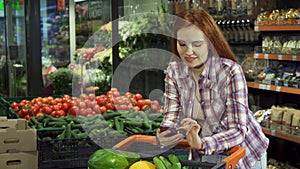 Woman browsing her shopping list on her smartphone