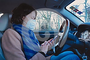 Woman Browsing Phone Inside Car