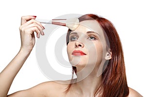 Woman with brush for make-up.