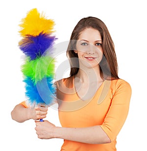 Woman with a brush to clean the dust