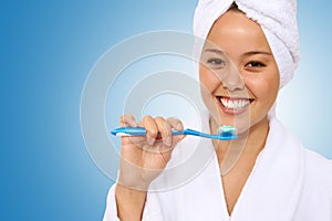 Woman Brushing Teeth