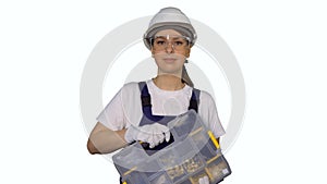 Woman builder in blue overalls and white hard hat helmet with toolbox.