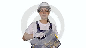 Woman builder in blue overalls and white hard hat helmet with toolbox.