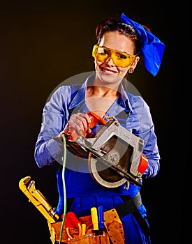 Woman builder with construction tools