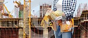 Woman or builder with gloves and working tools