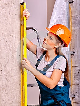 Woman in builder uniform