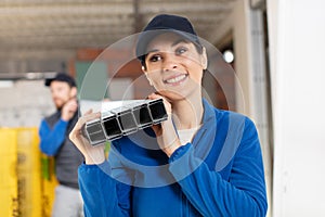woman builder working in construction site indoor