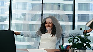 Woman business owner rejoicing success on work close up. Girl feeling happy.