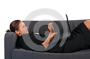 The woman the businessman has laid down on a sofa