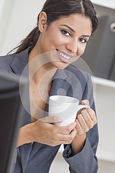 Woman Businesswoman Drinking Coffee in Office