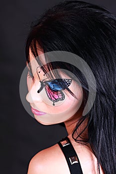 Woman with butterfly makeup