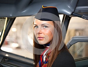 Woman in the cabine of airplane