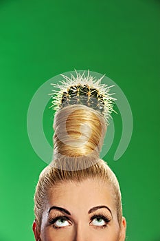 Woman with cactus in her hair