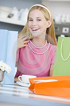 Woman in cafe taking break
