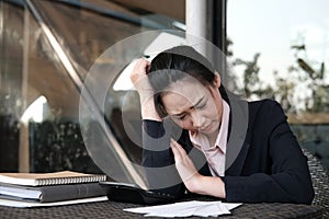 woman calculate domestic bills at home. Businesswoman using calculator at modern office. Young female checking balance & costs.