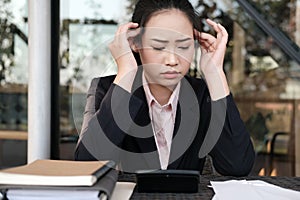 woman calculate domestic bills at home. Businesswoman using calculator at modern office. Young female checking balance & costs.