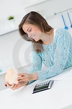 Woman calculating houshold costs