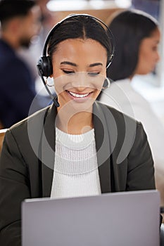 Woman, call center and smile at laptop for customer service, support and telemarketing. Face of an african female agent