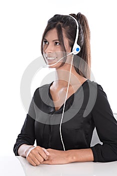 Woman in a call center - support operator with a headset, isolated on white