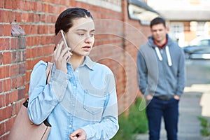 Woman Calling For Help On Mobile Phone Whilst Being Stalked On C