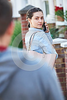Woman Calling For Help On Mobile Phone Whilst Being Stalked On C