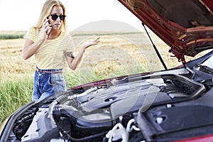 Woman calling for help on the road