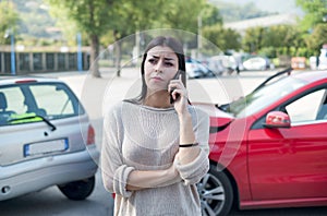 Woman calling towing service and roadside assistance