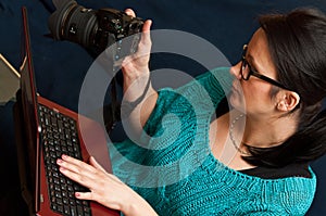 Woman with Camera and Laptop