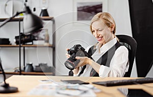 Woman with camera at office