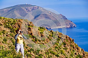 Woman take photo, Park Cabo de Gata, Spain photo