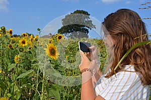 Woman, candid portrait taking photos outdoors