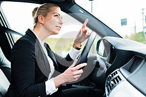 Woman in car being angry cursing other driver