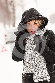 Woman car breakdown snow accident winter road