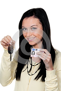 Woman with car keys and drivers license. Driving