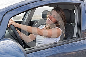 Woman in car singing