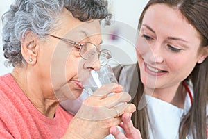 woman caring for senior lady