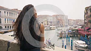 Woman with carnival mask in Venice