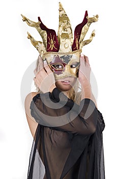 Woman with carnival venice mask on her face