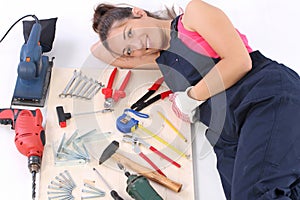 Woman carpenter with work tools